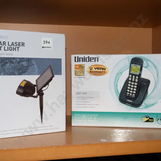 boxed Solar Laser spotlight, Uniden cordless phone