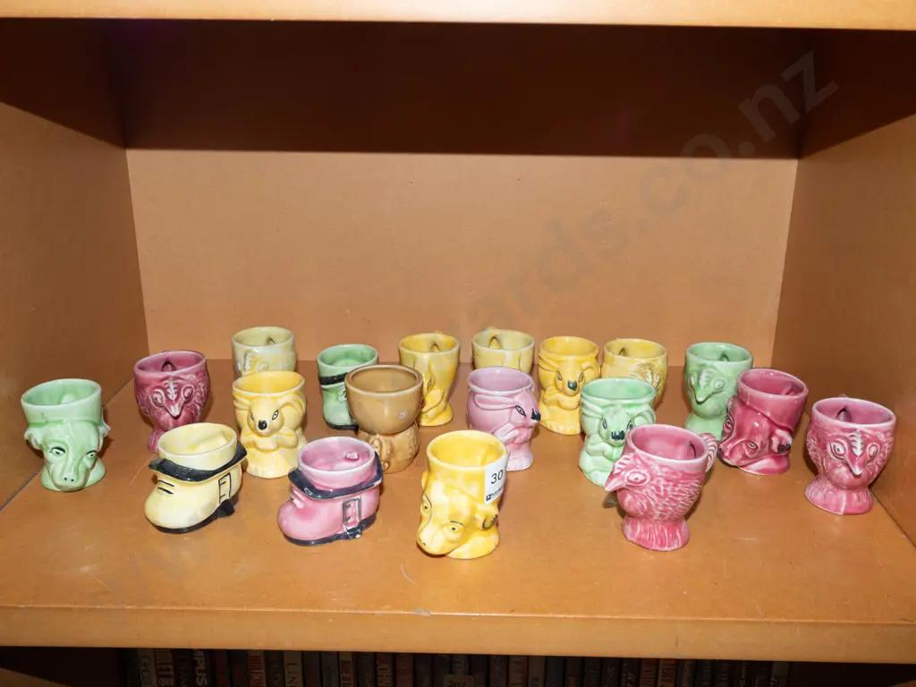 shelf of novelty egg cups Image 1++