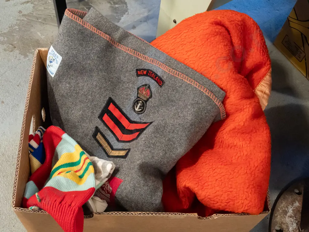box; orange blanket, grey woollen blanket with pennants and badges etc Image 1++