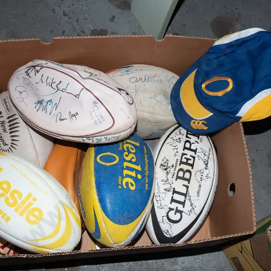box; rugby balls - some signed, Otago supporters cap