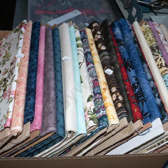 box of fabric pieces