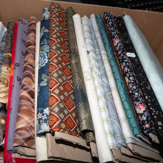 box of fabric pieces