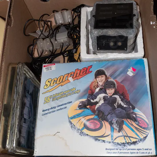 box; tins, solar powered rock/garden  light, inflatable snow tube