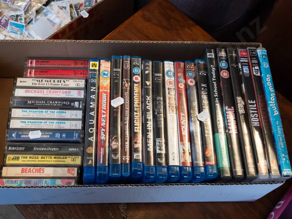 box of tape cassettes and DVDs Image 1++