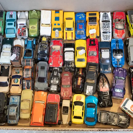 box of toy vehicles