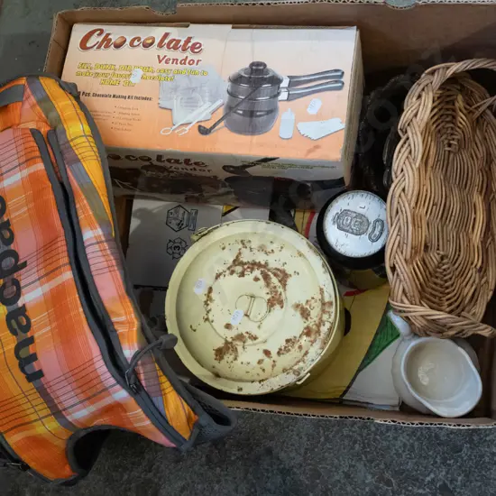 box; chocolate double boiler, small Macpac bag, tins, cane basket etc