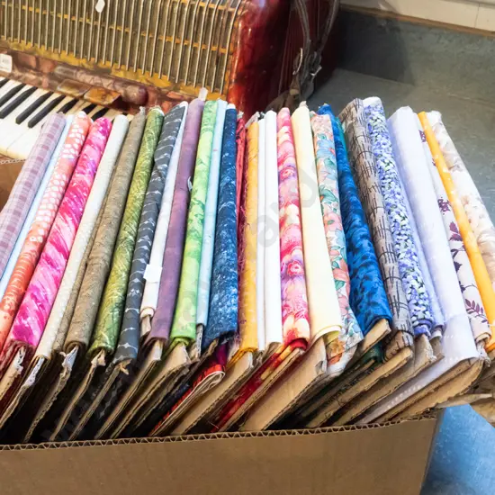 box of fabric pieces