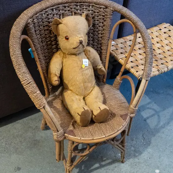 woven vintage child's chair, teddy bear