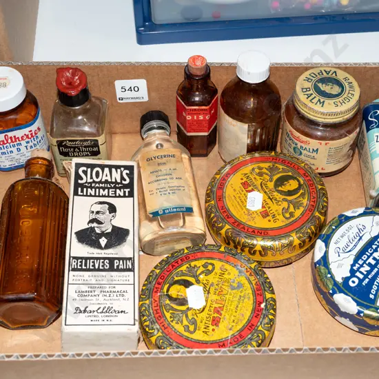 box; Rawleighs tins, linament bottles, castor oil etc