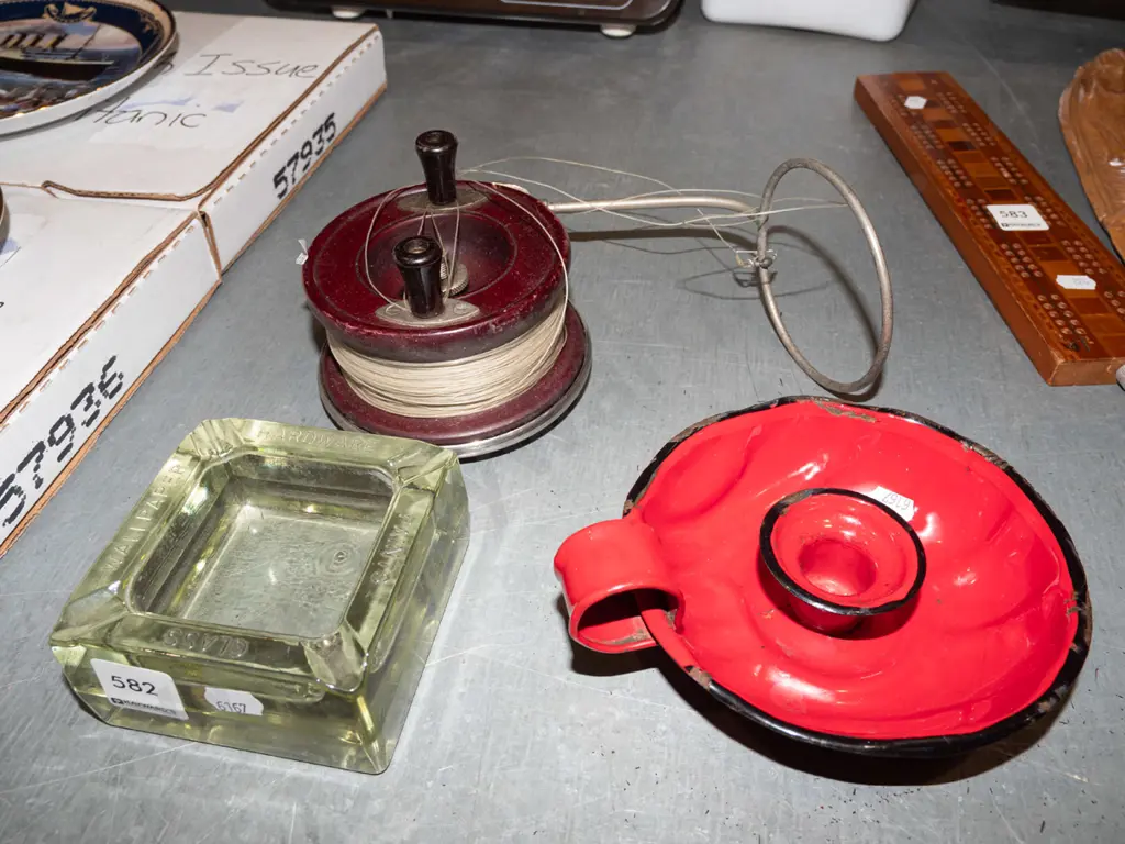 ashtray, chamber stick, fishing reel Image 1++