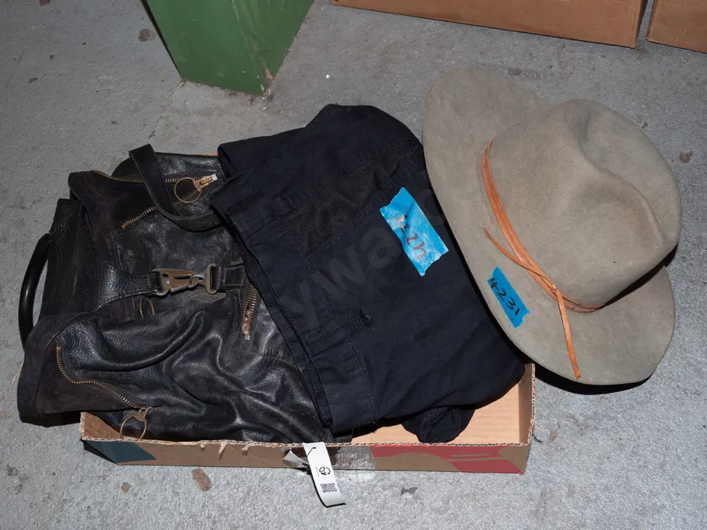 box; leather backpack, work trousers, stockmens hat Image 1++