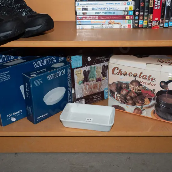 shelf; as new porcelain dishes, chocolate boiler, chocolate moulds