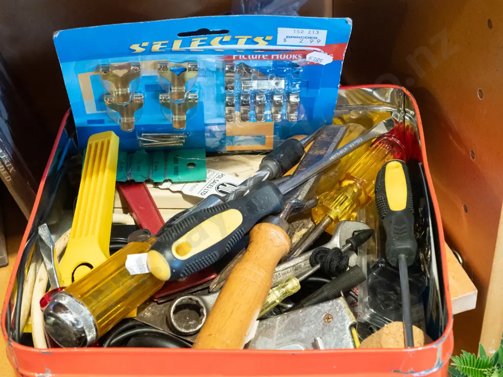 tin of various hand tools and picture hooks Image 1++