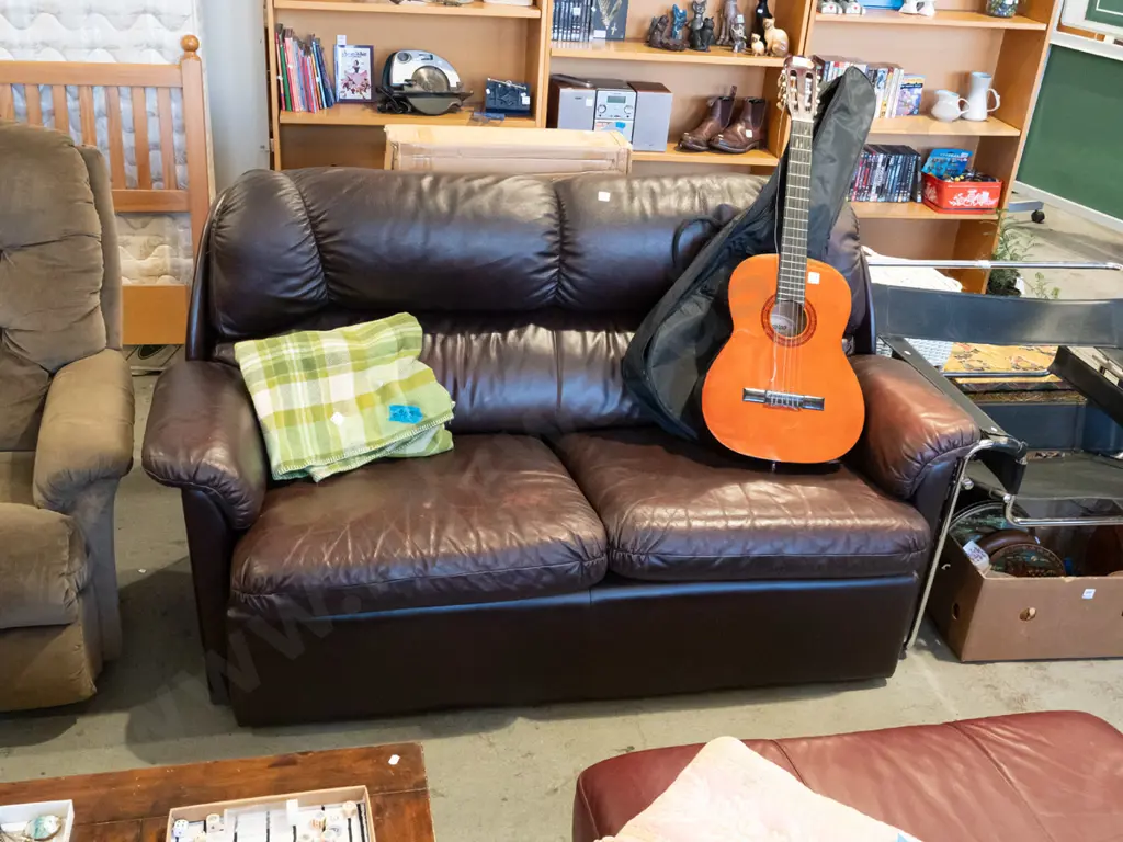 dark brown leather 2 seater settee - wear to right sofa arm Image 1++