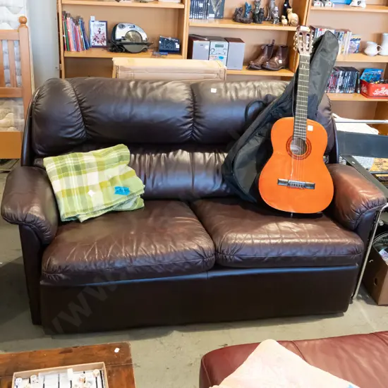 dark brown leather 2 seater settee - wear to right sofa arm