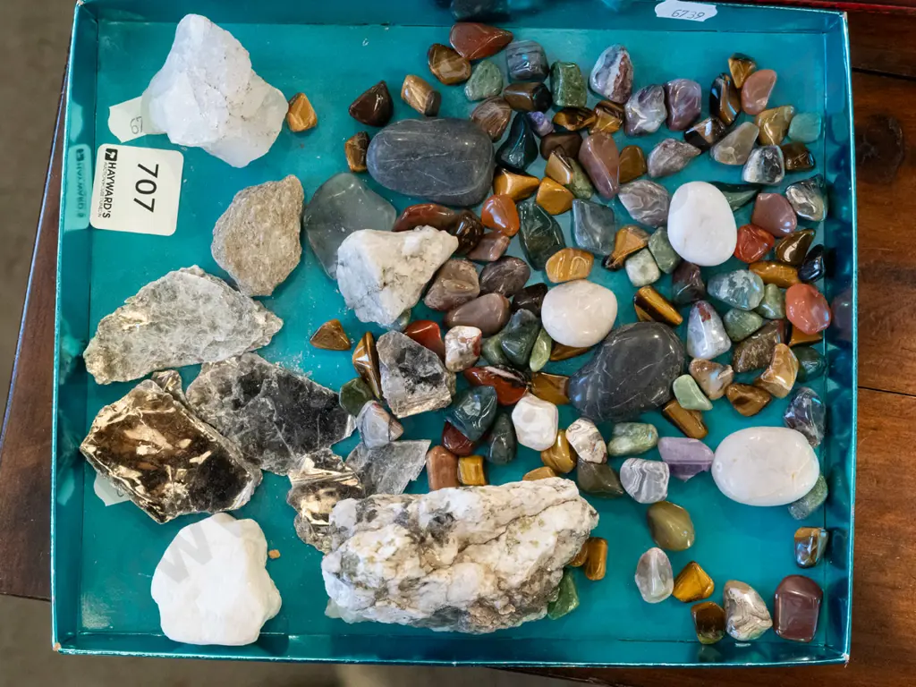 tray of polished and rough gemstones and minerals Image 1++