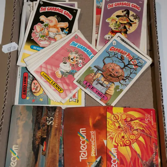 tray of 1990s Garbage Pail Kids & Garbage Gang collector cards and Telecom cards