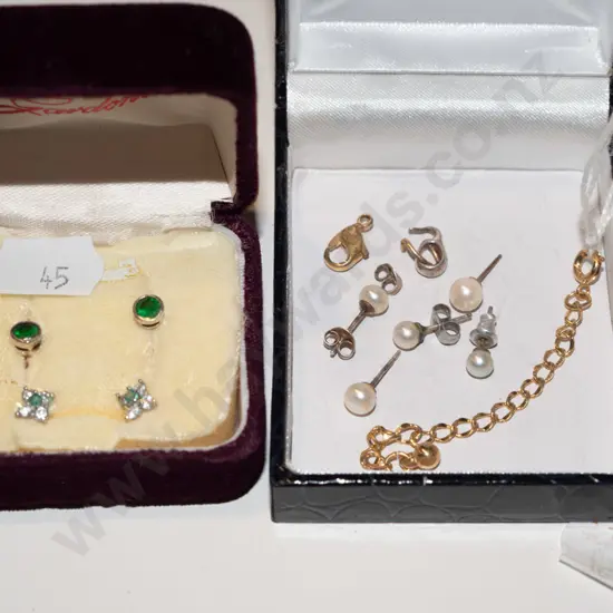2x containers of earrings