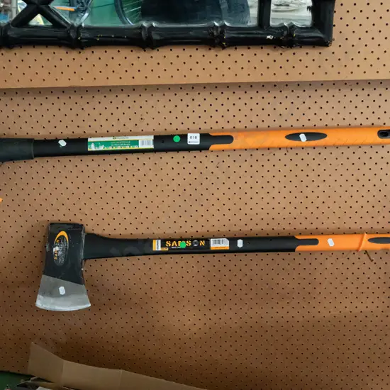 plastic handled log splitter, axe - green dots