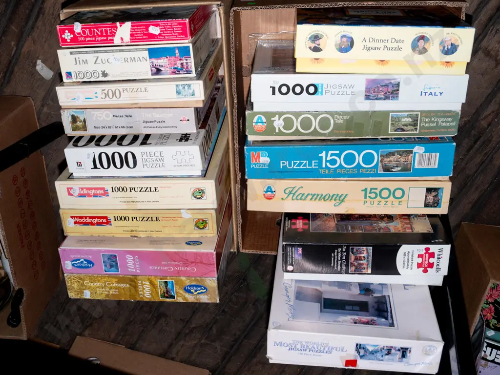 2x boxes of puzzles - green dots Image 1++