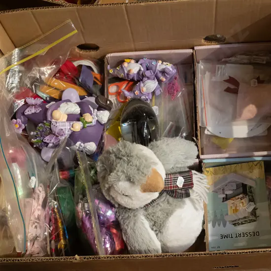box; ribbons, craft supplies, soft toys etc