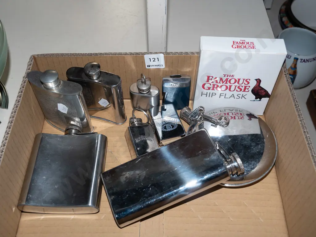 box of hip flasks, small flasks and lighters Image 1++