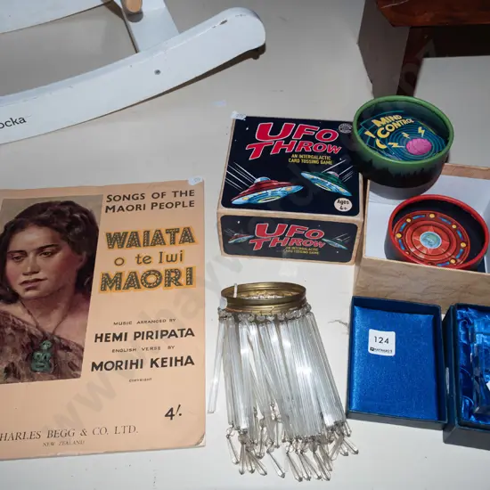 Maori song book, card games, glass lustres etc