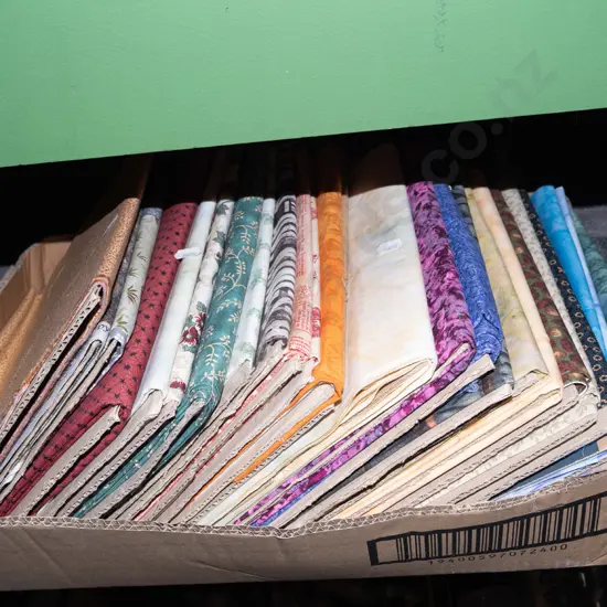 box of fabric pieces
