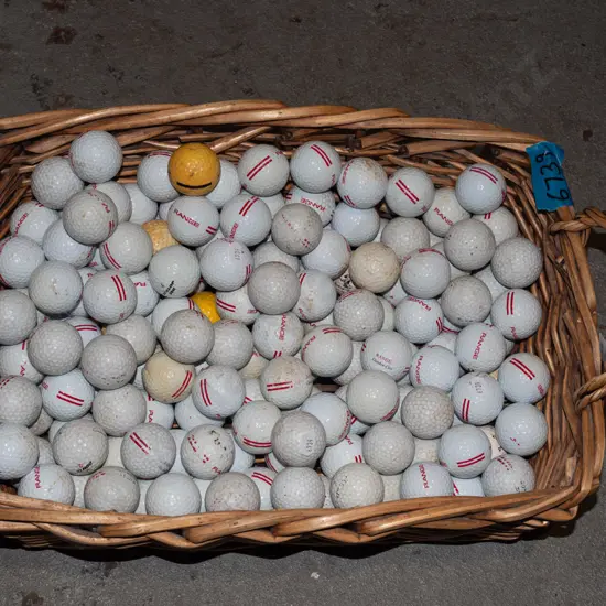 cane baskets, various golf balls