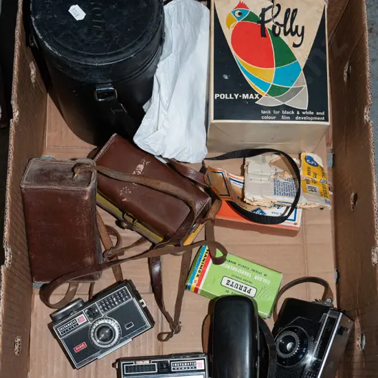 box; 35mm film cameras, large camera lens case etc