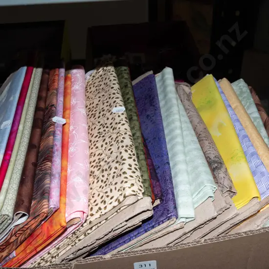 box of fabric pieces