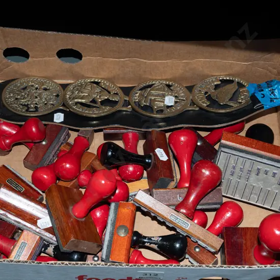 box; rubber office stamps, horse brasses
