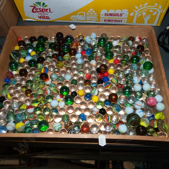 wooden tray of marbles