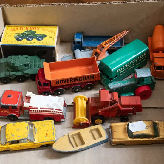 box of toy vehicles