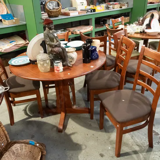 dropside extending pedestal Indonesian hardwood table with 6 ladder back chairs H770 Diam1020