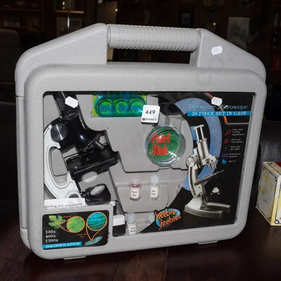 plastic cased Discovery microscope