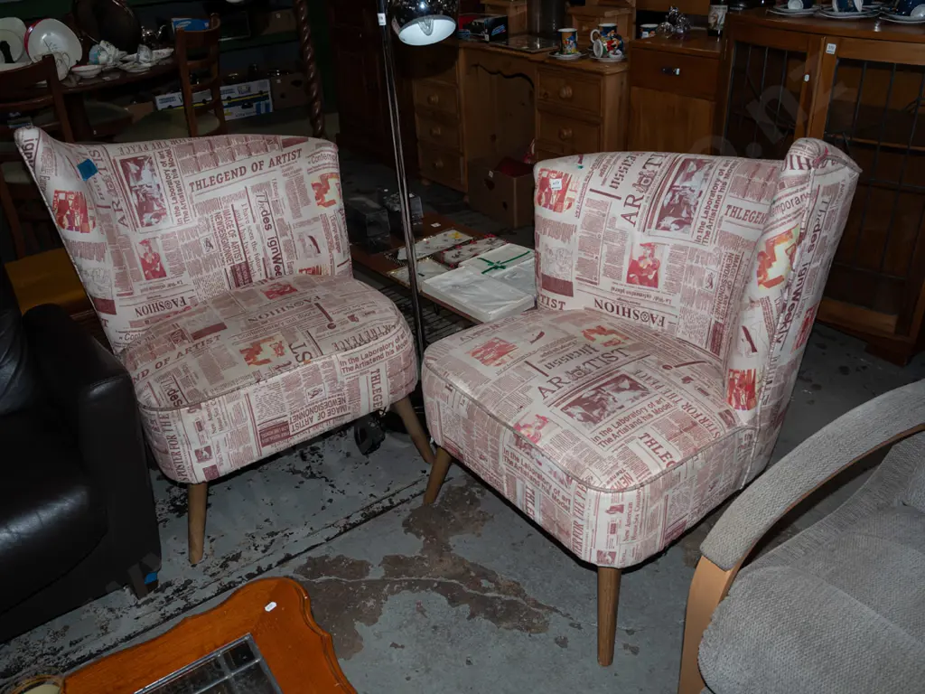 pair of asymetrical post modern chairs with art newspaper print - stains to fabric  Image 1++