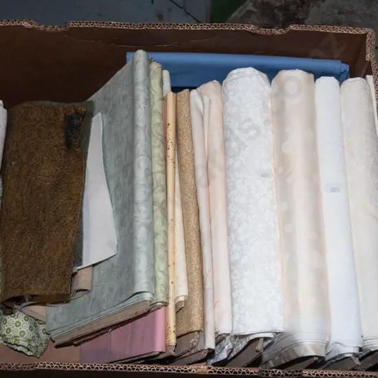 box of fabric pieces