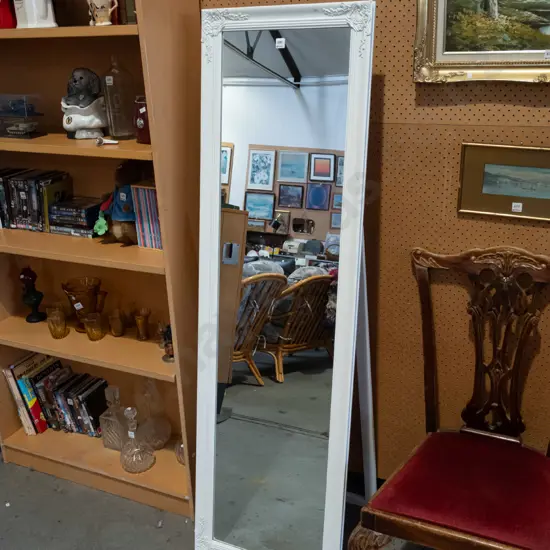 white framed freestanding mirror