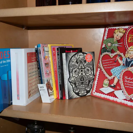 various design and retro books - Penguin book covers, Taschen robots, valentines, Viva Posada, Book of Skulls etc.
