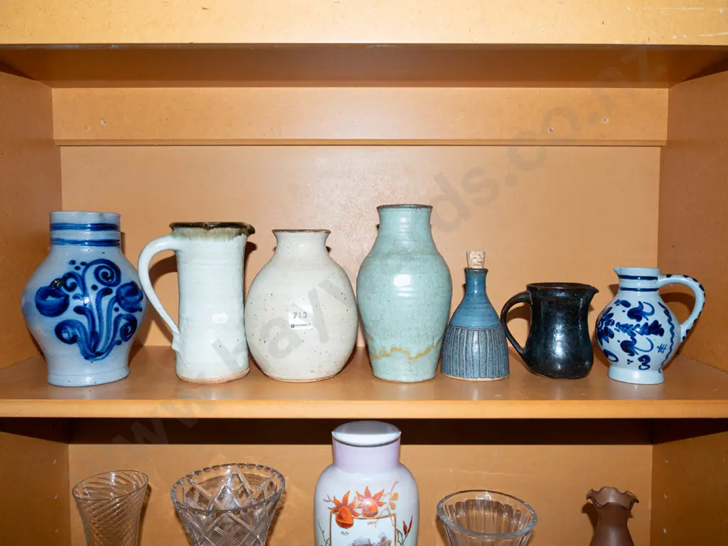 shelf of pottery items Image 1++
