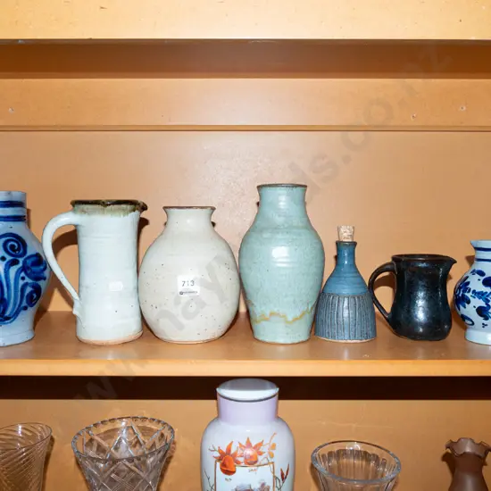 shelf of pottery items