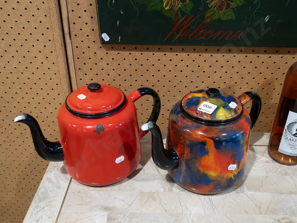 1x red and 1x multi coloured teapots Image 1++