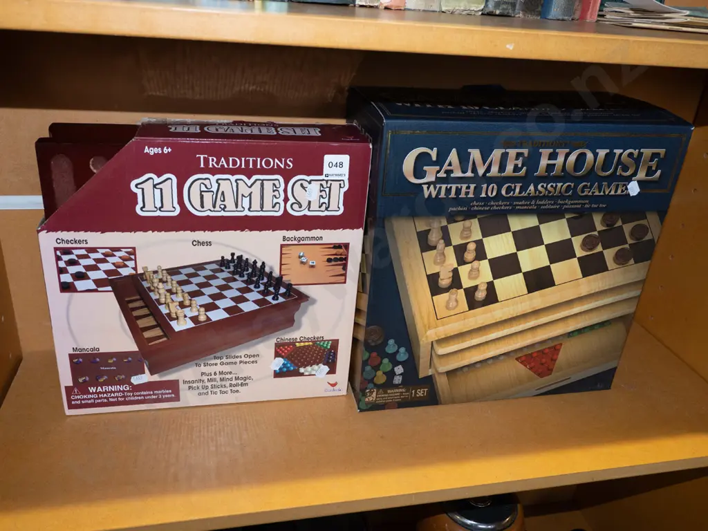 2x boxed as new games compendiums Image 1++