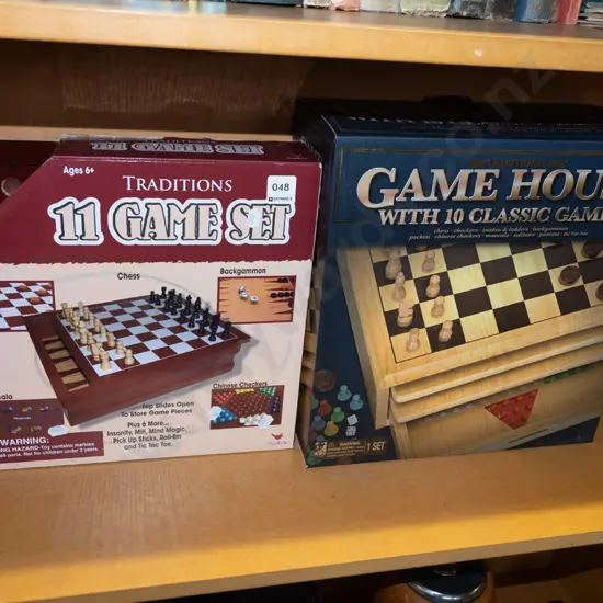 2x boxed as new games compendiums