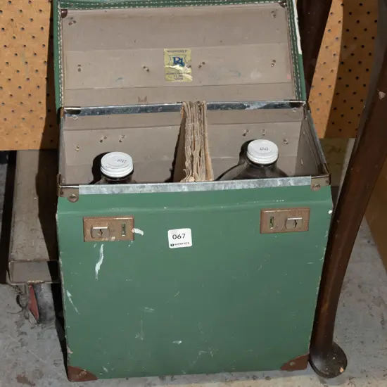 2 glass flagons in carry case