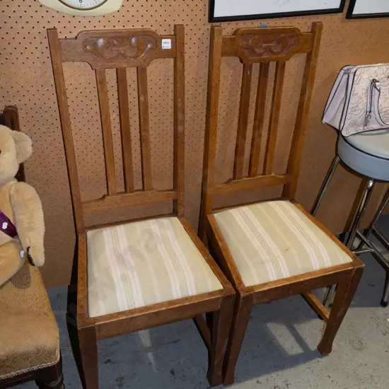 2x carved oak high back dining chairs