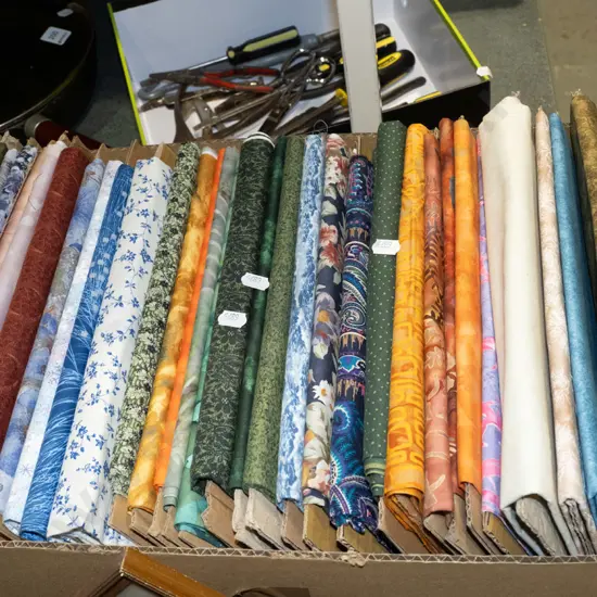 box of fabric pieces