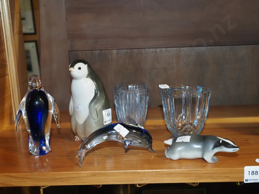 glass penguin & dolphin, ceramic badger & penguin, blue depression glass vase & creamer Image 1++