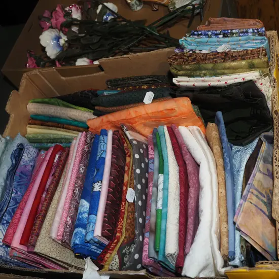 box of fabric pieces
